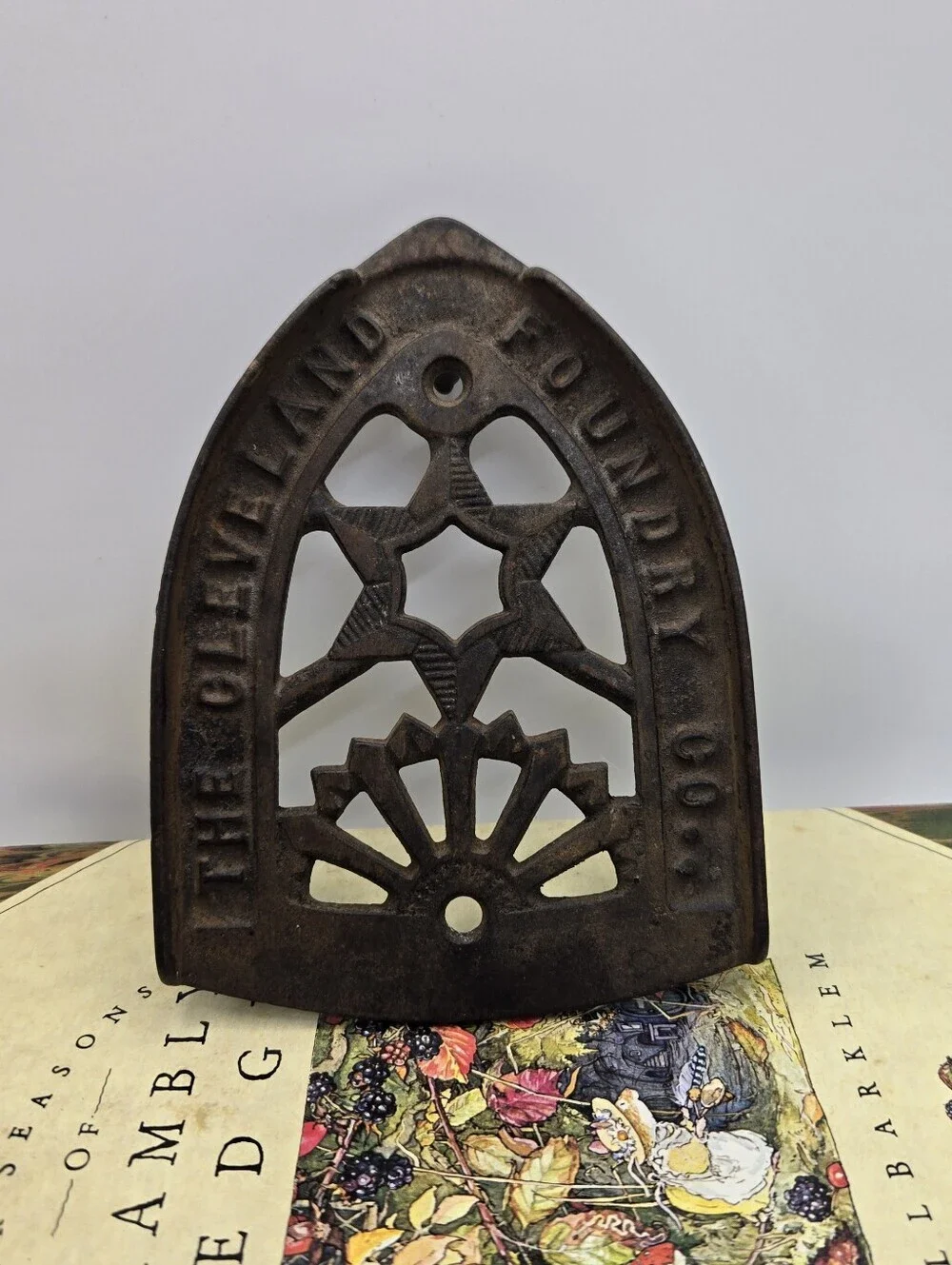 Antique Cast Iron Trivet Manufactured by The Cleveland Foundry Co. in Ohio.